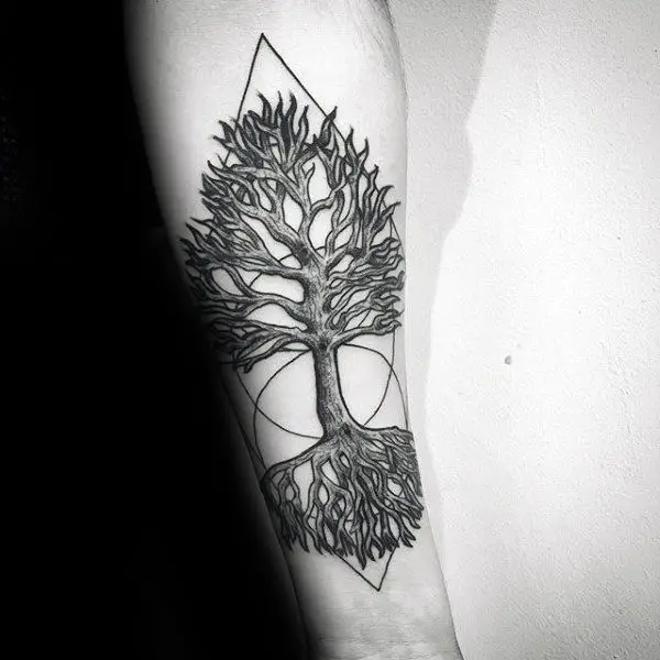 circle-with-triangles-mens-tree-roots-forearm-tattoo