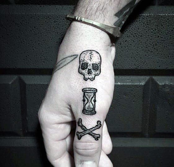 finger-and-hand-guys-traditional-hourglass-with-skull-and-cross-bones-tattoo