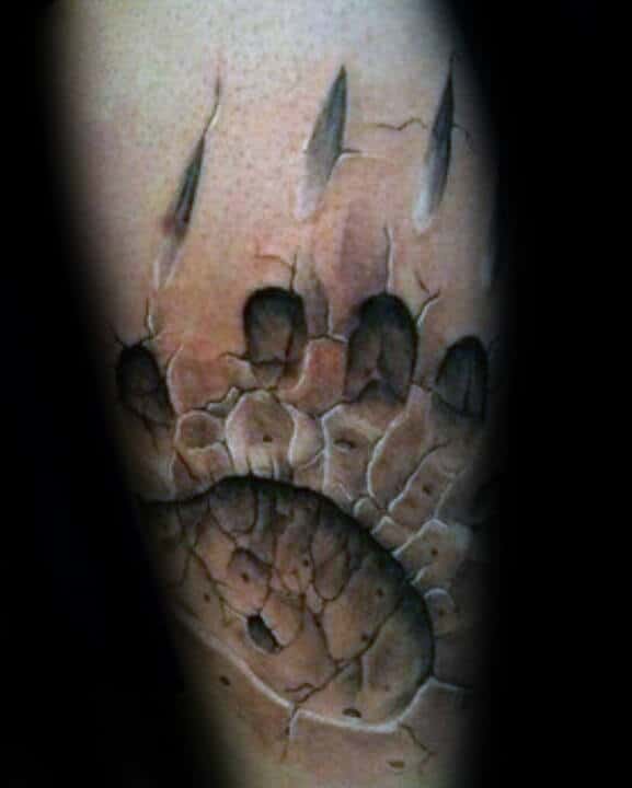 guys-3d-bear-claw-stone-tattoo-on-forearm