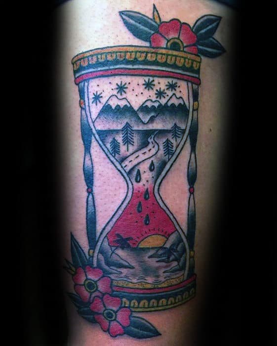 mountains-with-beach-landscape-inside-traditional-hourglass-mens-arm-tattoo