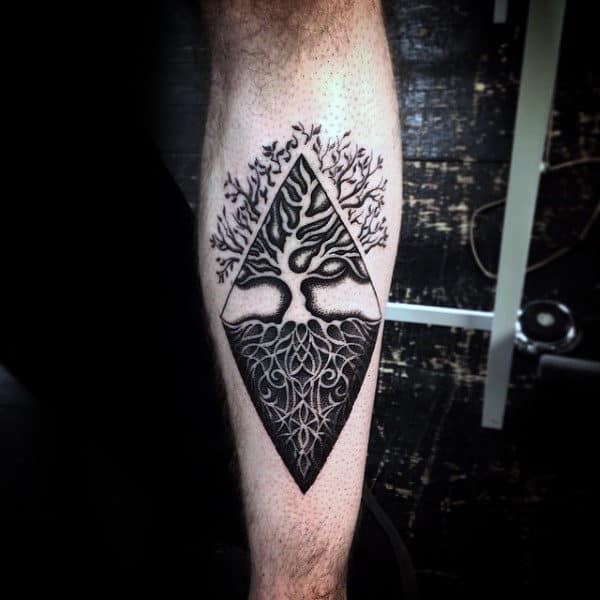 negative-space-tree-roots-mens-inner-forearm-tattoos