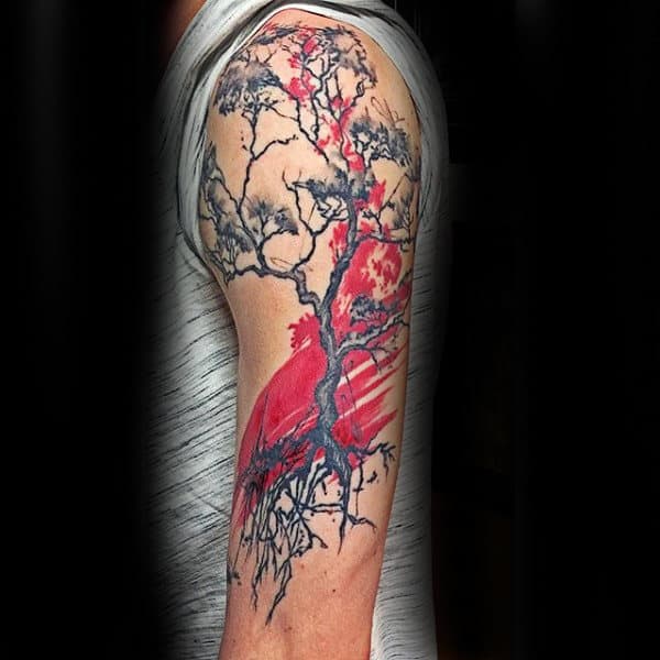 paint-brush-stroke-red-and-black-ink-guys-tree-roots-arm-tattoo