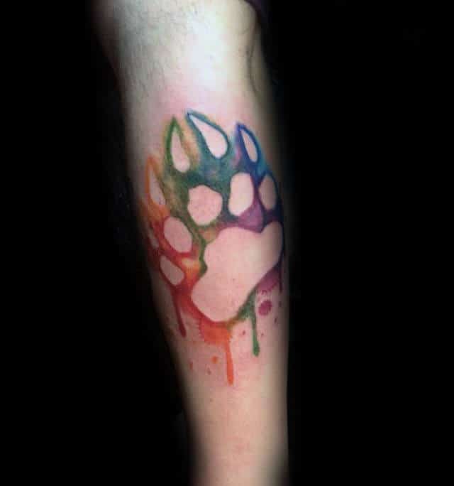 watercolor-bear-claw-negative-space-male-forearm-tattoo-design-ideas