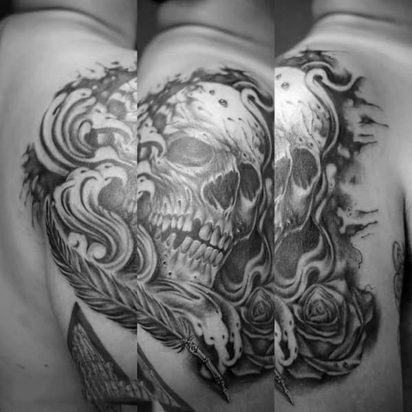 arm-skull-with-rose-flower-and-quill-mens-tattoo-ideas