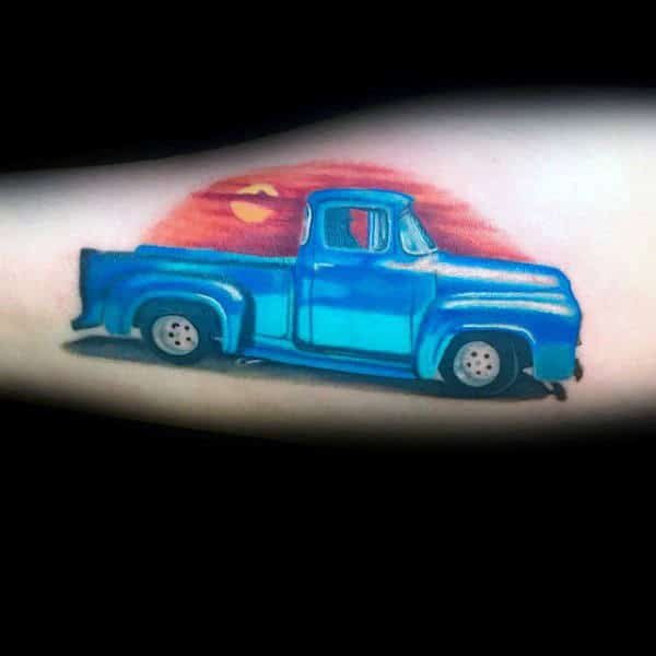 blue-truck-with-sunset-mens-arm-tattoo-design-ideas