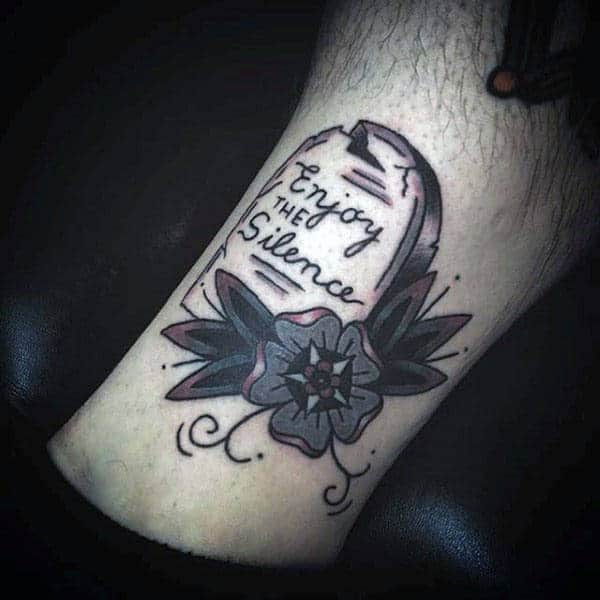 enjoy-the-silence-tombstone-mens-leg-tattoo-with-old-school-flower-design