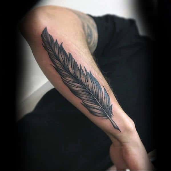 gentleman-with-quill-tattoo-on-outer-forearm
