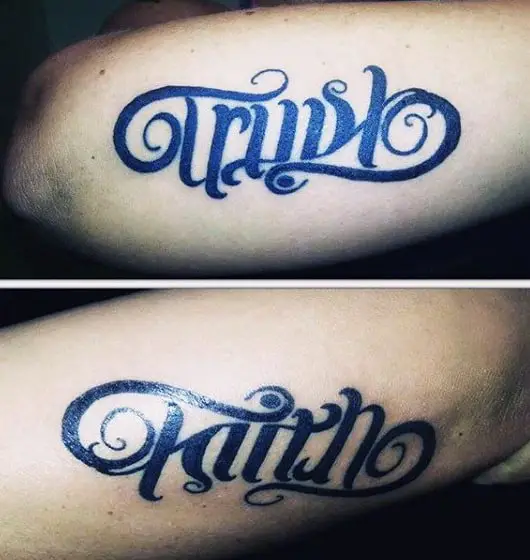 guys-trust-faith-ambigram-tattoos-on-outer-forearm