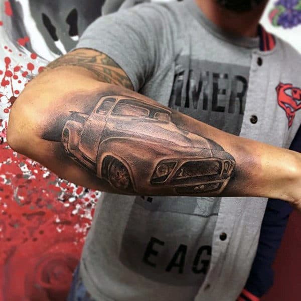 male-with-outer-forearm-shaded-old-school-truck-tattoo