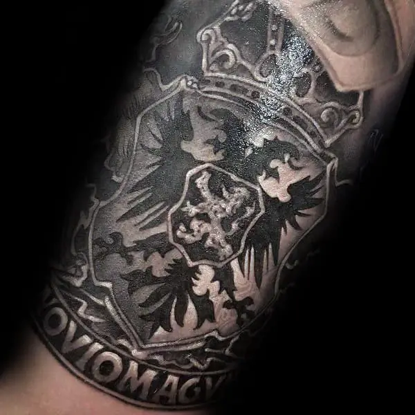 Skin Rip Shield Tattoo by Capone  Tattoos