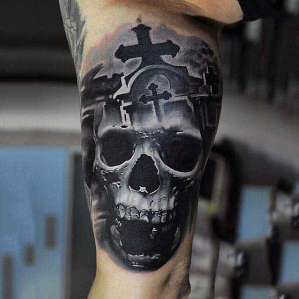 realistic-detailed-skull-tombstone-tattoos-for-men-on-bicep