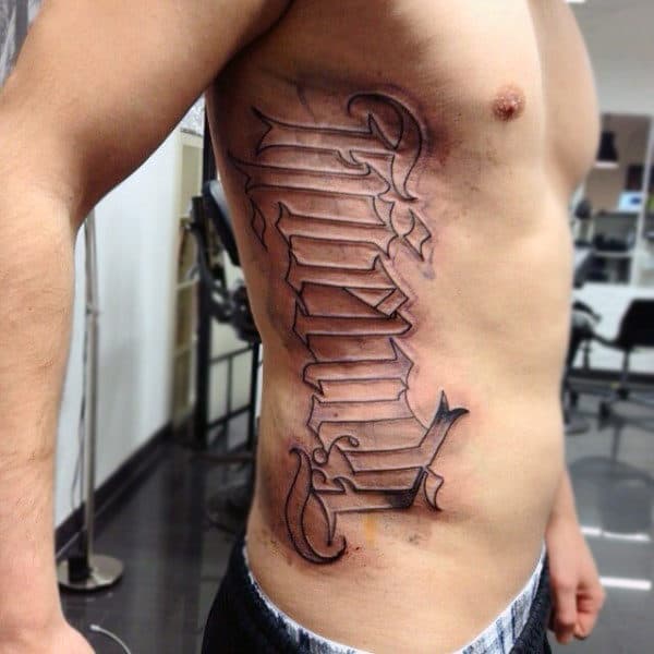 rib-cage-side-ambigram-lettering-mens-tattoos