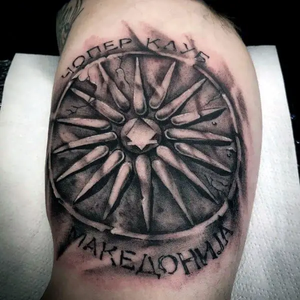 shield-black-ink-guys-arm-tattoo
