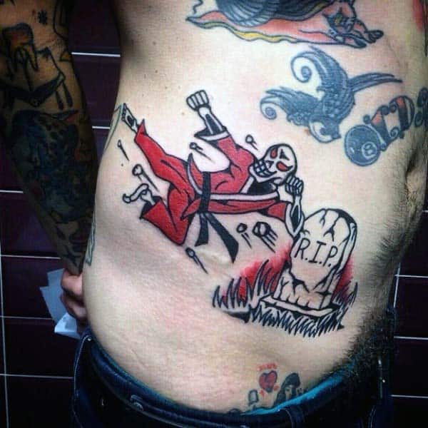 skeleton-ninja-rip-tombstone-tattoo-design-on-rib-cage-side-of-guy