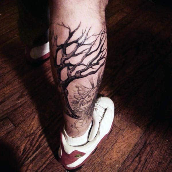 tree-leg-calf-tombstone-tattoos-for-men-in-black-ink