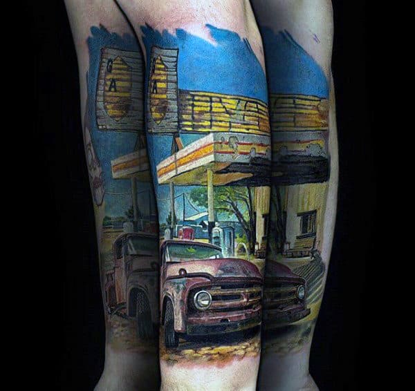 truck-at-gas-station-mens-forearm-tattoo-with-colorful-design
