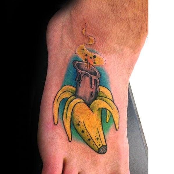 banana-with-candle-guys-tattoo-designs-on-foot