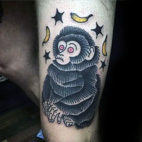 cool-male-banana-monkey-thigh-tattoo-designs