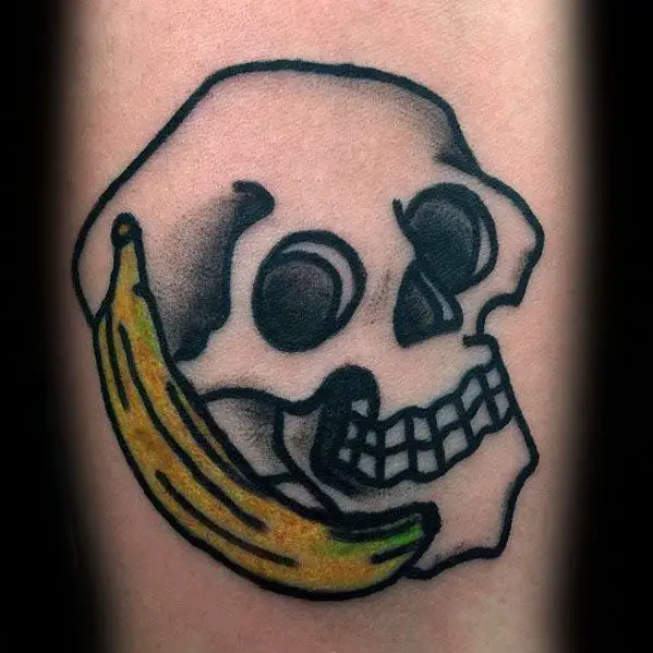 inner-forearm-mens-skull-banana-tattoo-design-inspiration