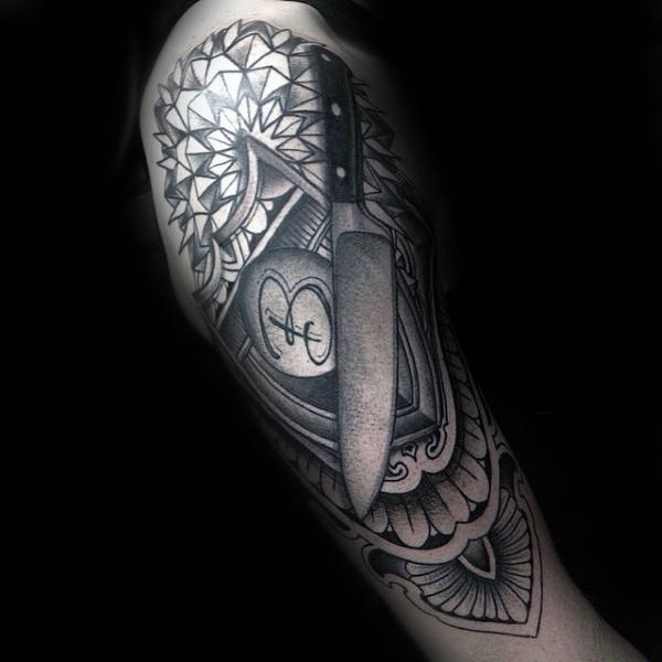 male-with-half-sleeve-floral-chef-knife-tattoo