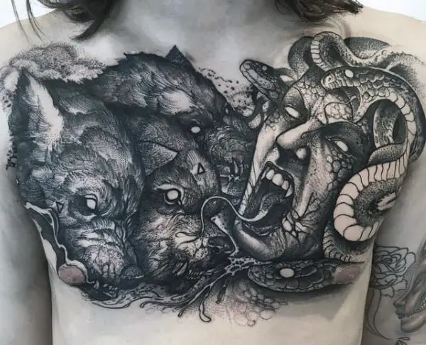 medusa-against-cerberus-mens-upper-chest-tattoo-designs