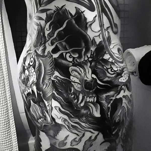 mens-side-of-hip-cerberus-tattoo