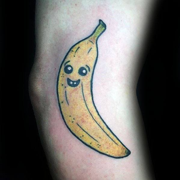 small smiling banana tattoos for gentlemen