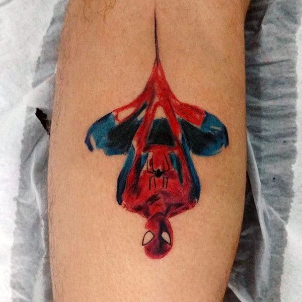 tiny-spiderman-painting-tattoo-guys-forearms