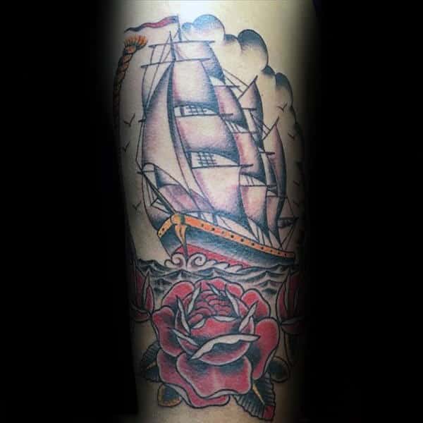 cool-traditional-rose-with-sailing-ship-male-forearm-tattoo-design-ideas
