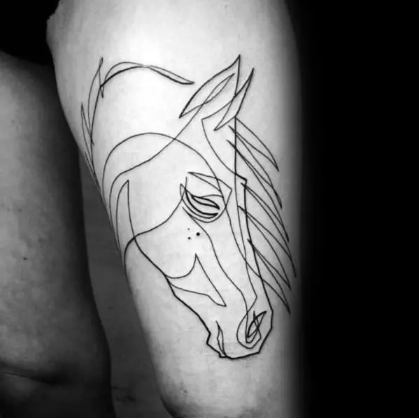 guy-with-continuous-line-tattoo
