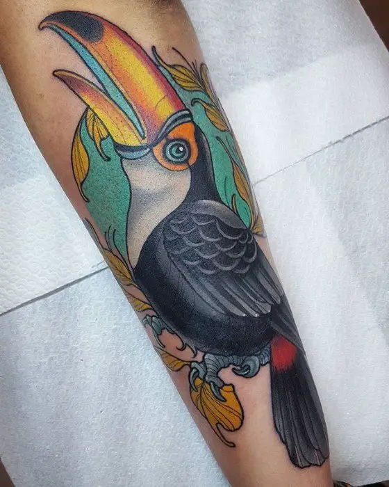 male-tattoo-with-toucan-design