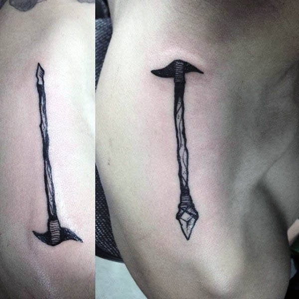 mens-shoulders-spear-through-skin-tattoo-designs