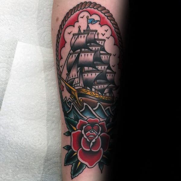 rose-flower-with-sailing-ship-male-traditional-forearm-tattoos