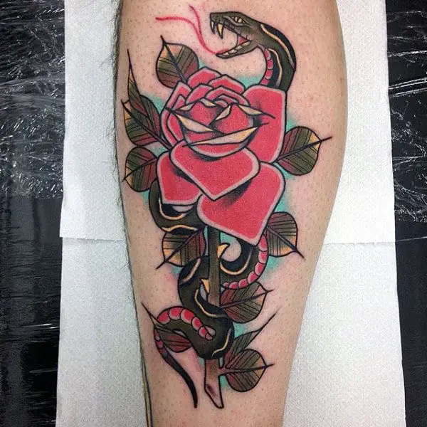 snake-with-rose-flower-male-traditional-leg-tattoo