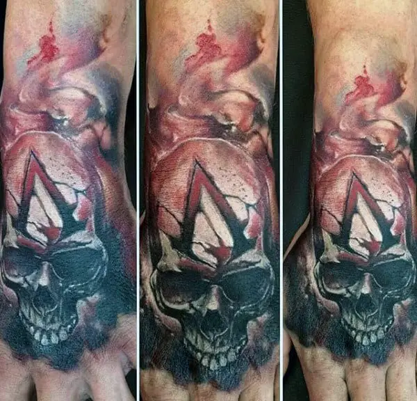 guys-hand-tattoo-of-assassins-creed-video-game-skull-design