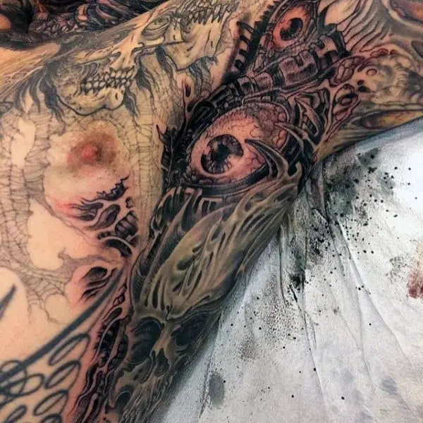 mens-armpit-large-brown-shaded-eye-tattoo