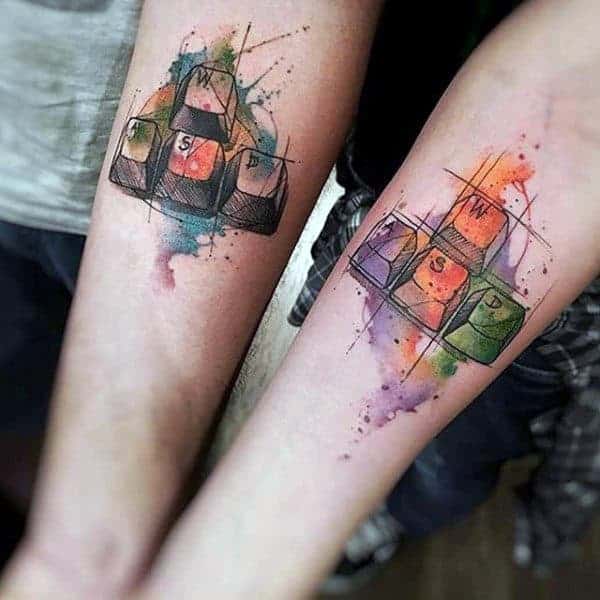 watercolor-keyboard-keys-video-game-inspired-tattoos-for-guys