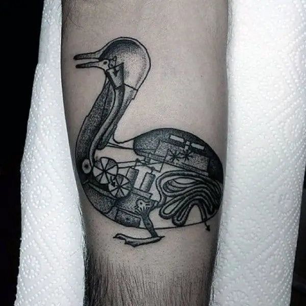 bio-mechanical-duck-blakc-and-white-unique-tattoo-on-man