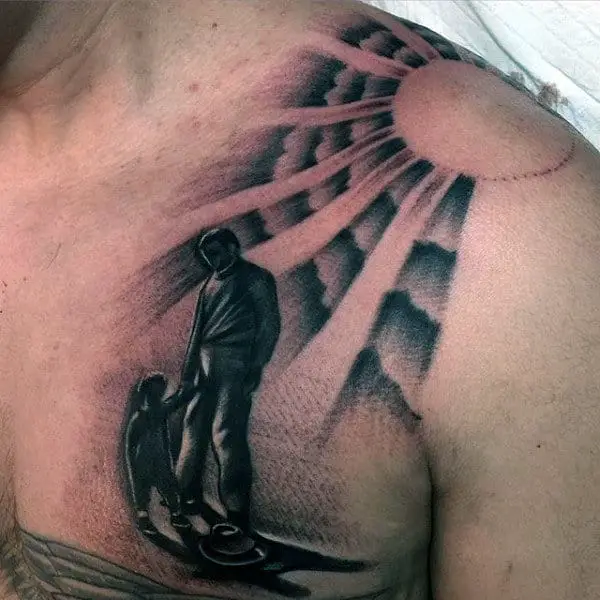 child-and-grandpa-mens-chest-tattoo-with-rising-sun-design