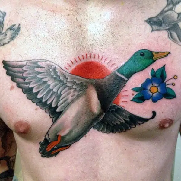 colorful-duck-chest-piece-tattoo-over-rising-sun-for-guys