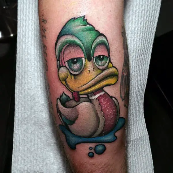 cool-cartoon-duck-in-puddle-tattoo-for-guy