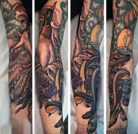 detailed-realistic-duck-full-sleeve-tattoo-on-guy