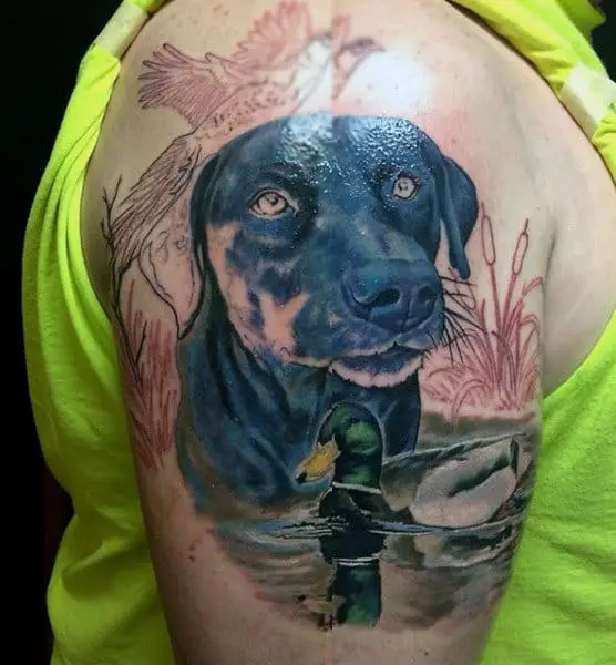 illustrative-portrait-of-dog-and-duck-pond-tattoo-for-man