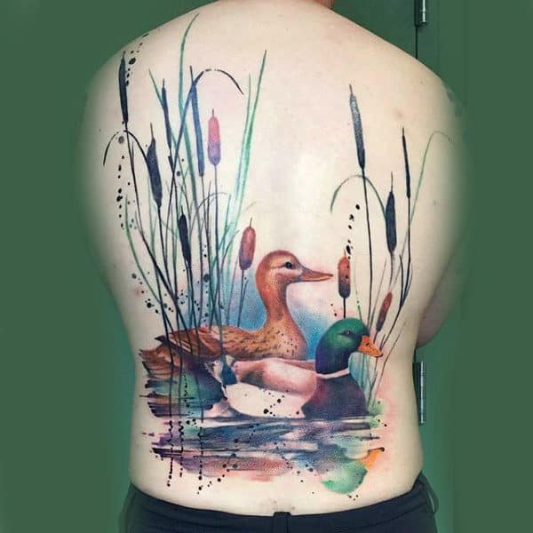 modern-watercolor-artistic-ducks-on-pond-back-tattoo-for-guy