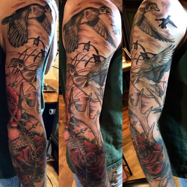 shded-full-sleeve-on-male-of-ducks-flying-tattoo