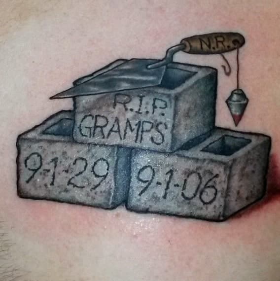 stonemason-male-grandpa-rip-tattoo-on-chest