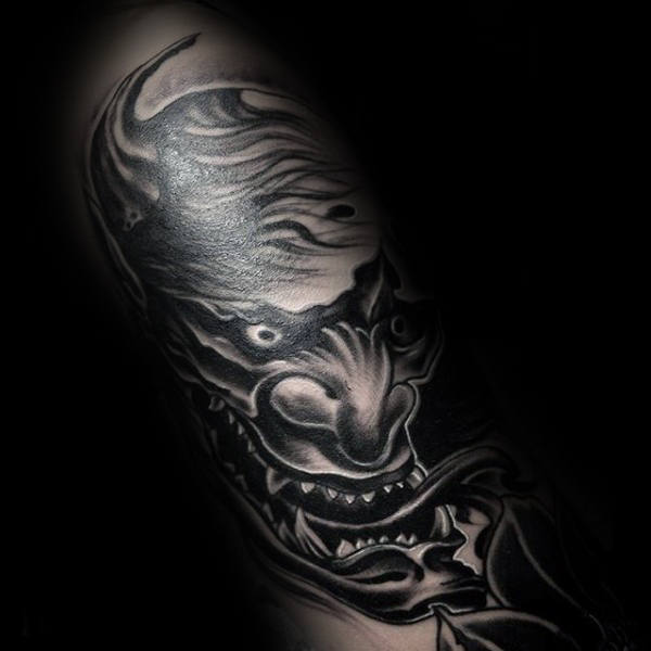 black-ink-hannya-mask-dark-mens-tattoo-ideas