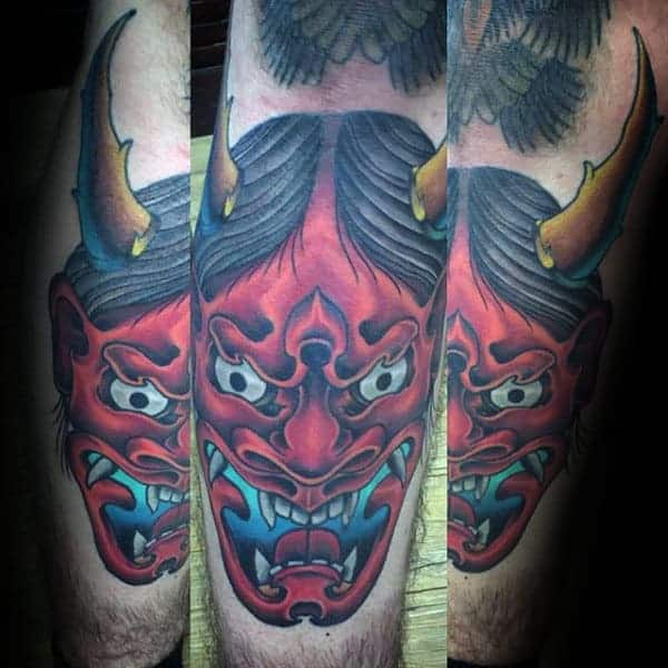 cool-hannya-mask-with-bull-horns-mens-leg-shin-tattoos