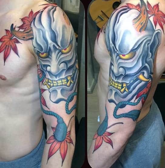 fall-leaves-mens-hannya-mask-upper-arm-tattoo