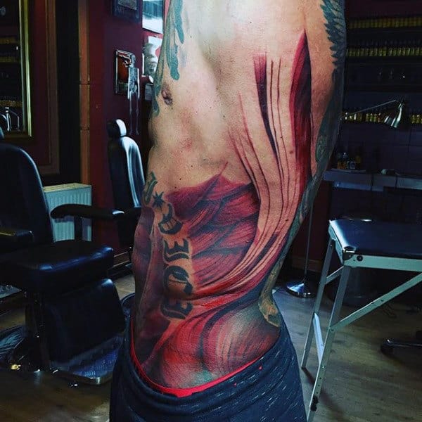 gentleman-with-rib-cage-side-muscle-tattoo